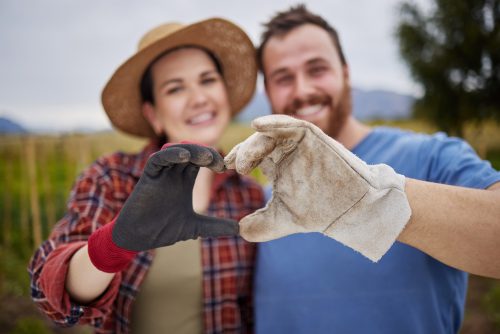 Farmer Gardener Couple Showing Love Heart Sign With Their Hands Outdoors Organic Sustainable Farm Happy Excited Activists Support Sustainability Organic Farming